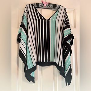 Black, white, and turquoise top